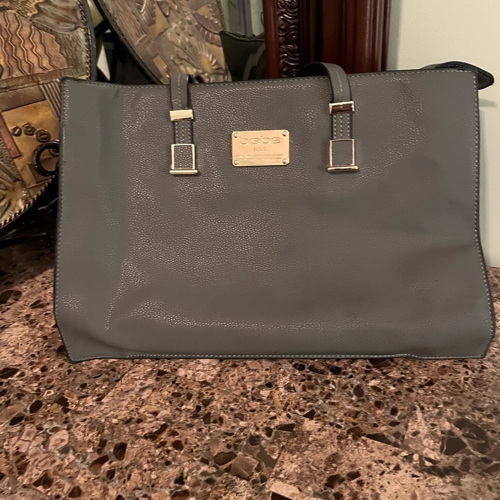Bebe shoulder bag with additional strap attached